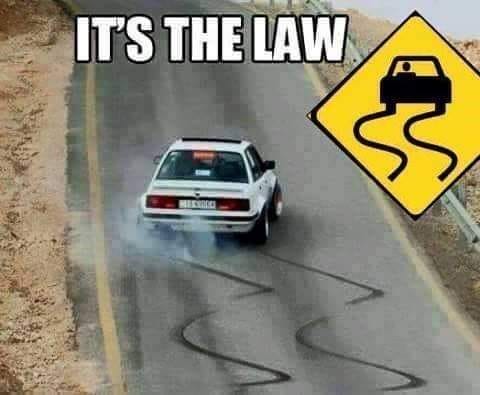 its the law skid mark sign.jpg
